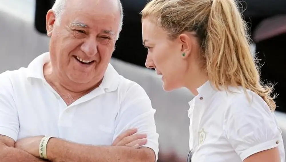 Amancio Ortega junto a su hija Marta, en una imagen de archivo