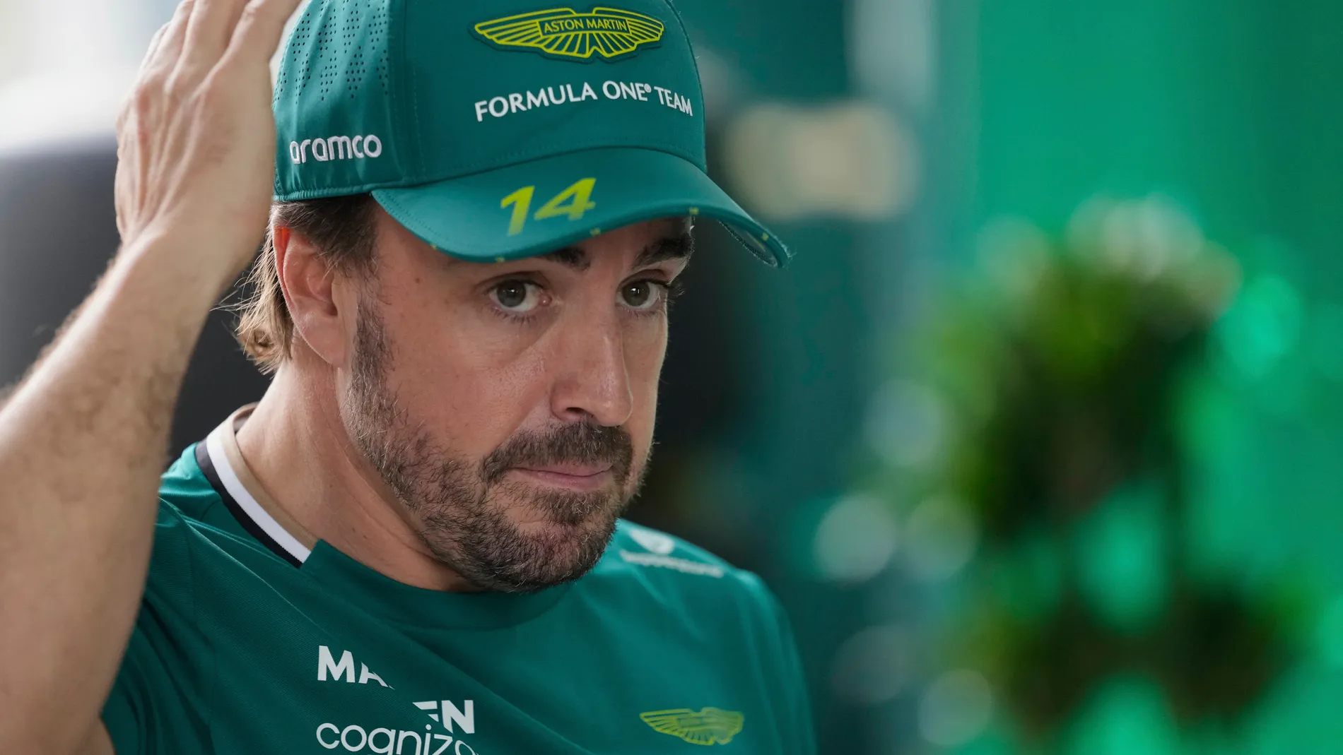 Aston Martin driver Fernando Alonso of Spain arrives prior to the Formula One Saudi Arabian Grand Prix at the Jeddah Corniche Circuit in Jeddah, Saudi Arabia, Sunday, April 20, 2025. (AP Photo/Darko Bandic)