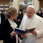 A handout picture provided by the Vatican Media shows Pope Francis meeting with Spanish Minister of Labor and Social Economy Yolanda Diaz Perez (L) in Vatican, 11 December 2021