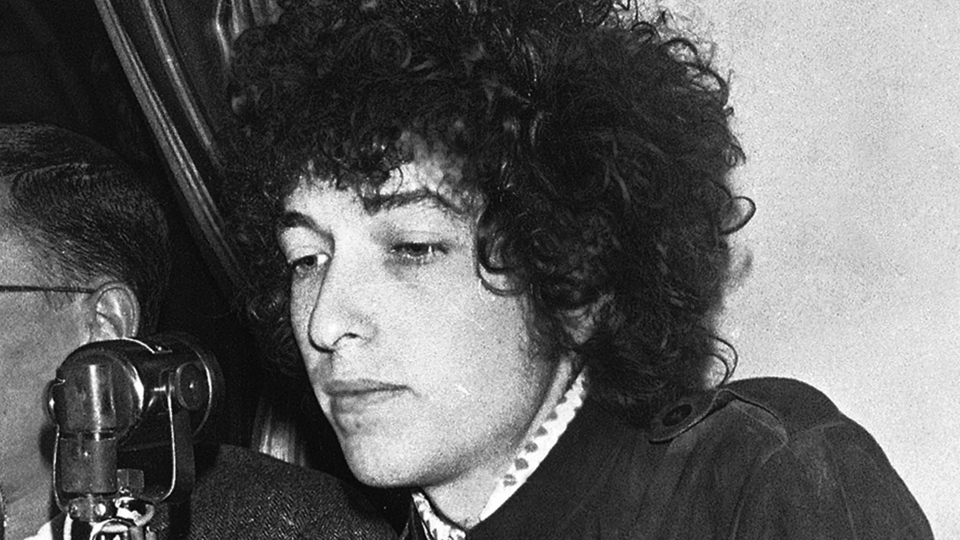 Bob Dylan gestures during a press conference in Paris, France.
