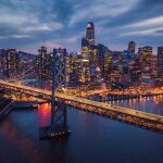 Aerial Cityscape view of San Francisco and the Bay Bridge at Night, California, USA